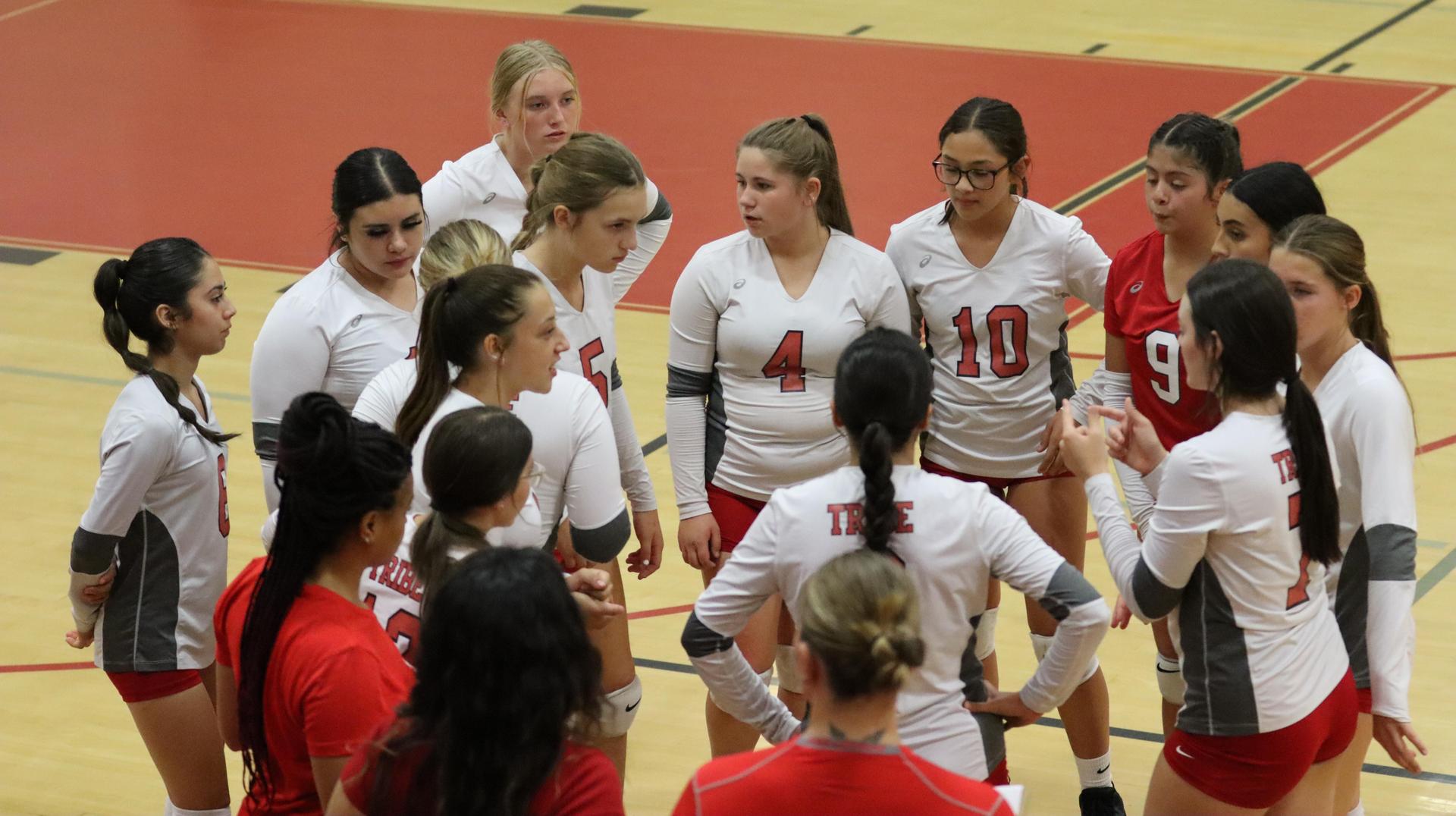 junior varsity girls playing volleyball against Yosemite