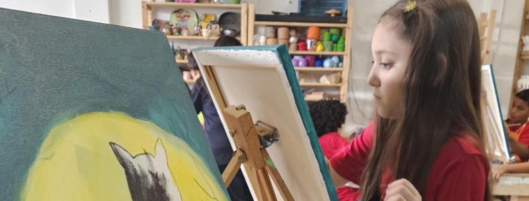 student at an art studio