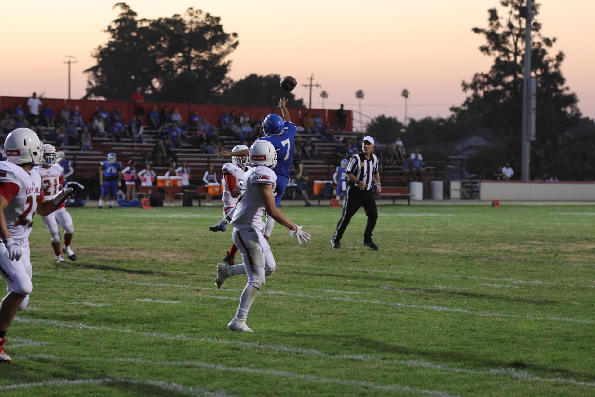 Junior Varsity football players in action against Caruthers