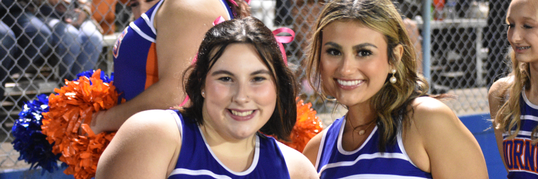 Cheerleaders at football game