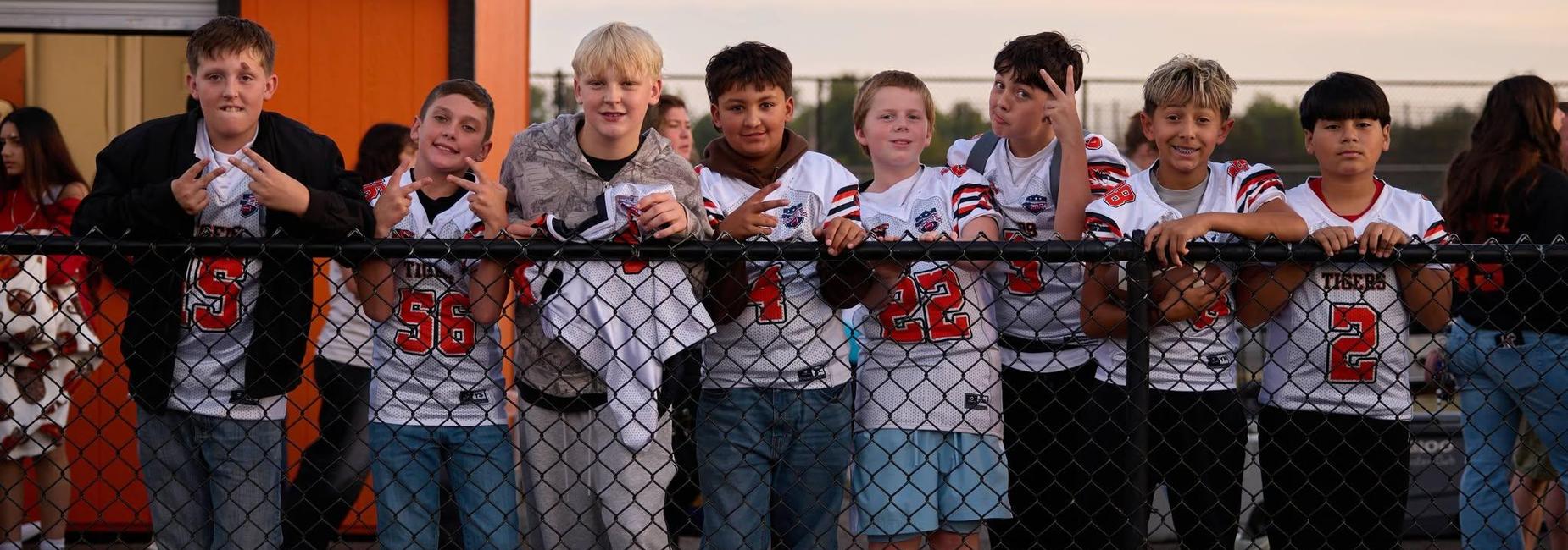 Youth football cheering CHS Tiger Football team
