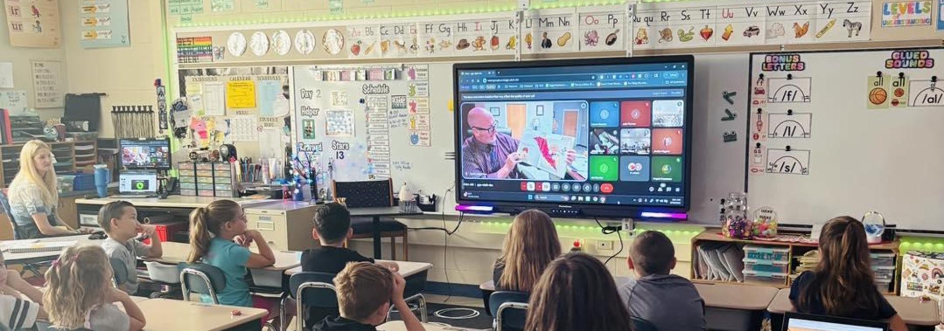 Dr. Holtzman Reading to Stanwood Students