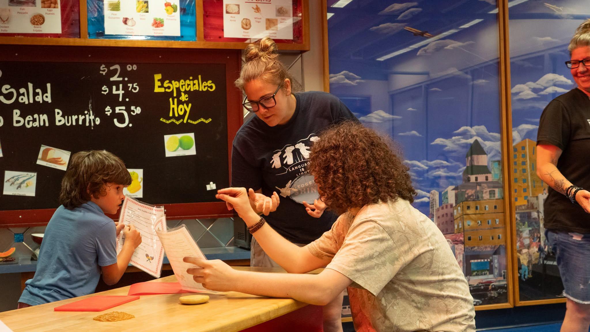 Photo of students and teacher in a classroom