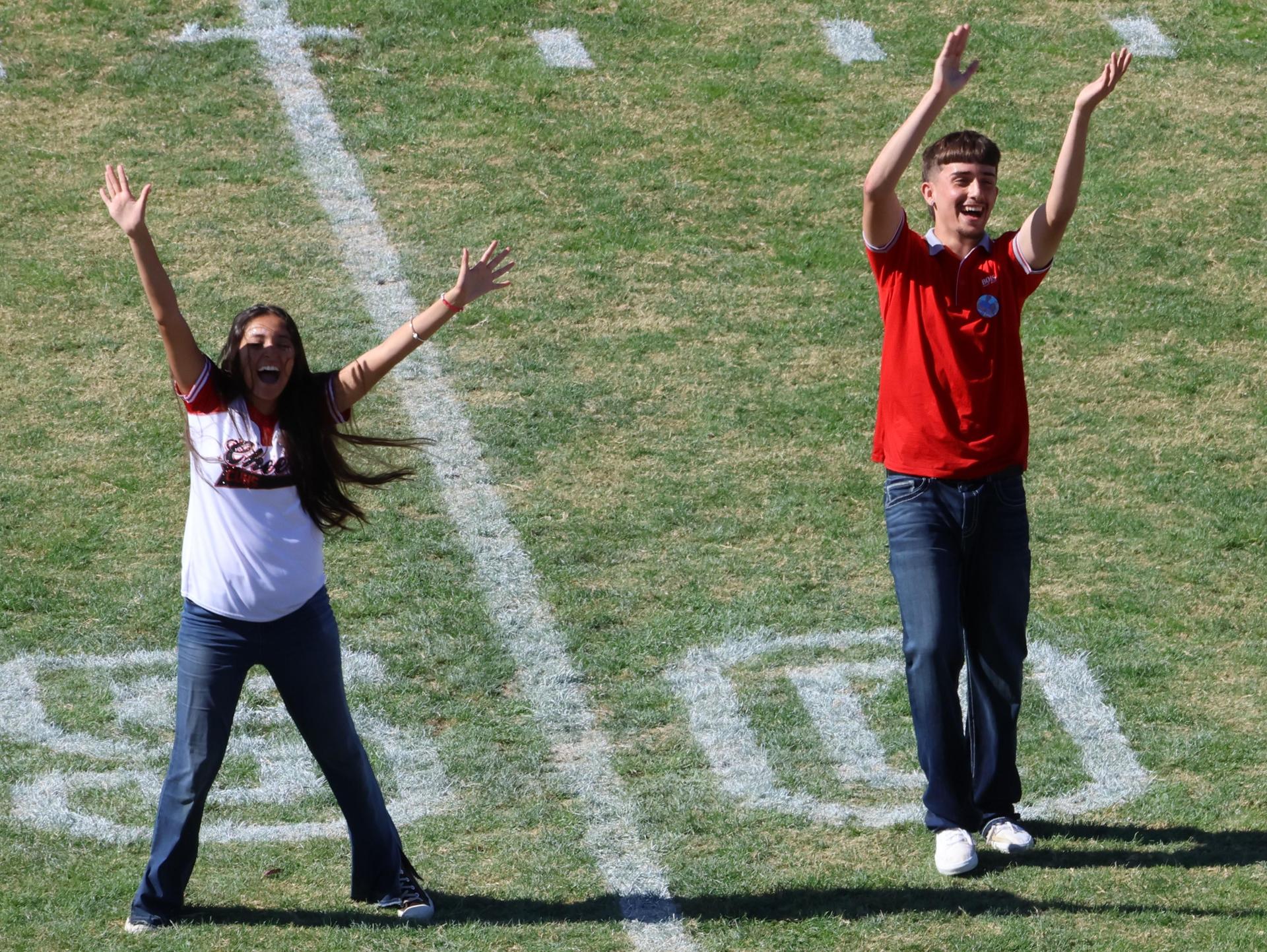 students and staff at the homecoming rally