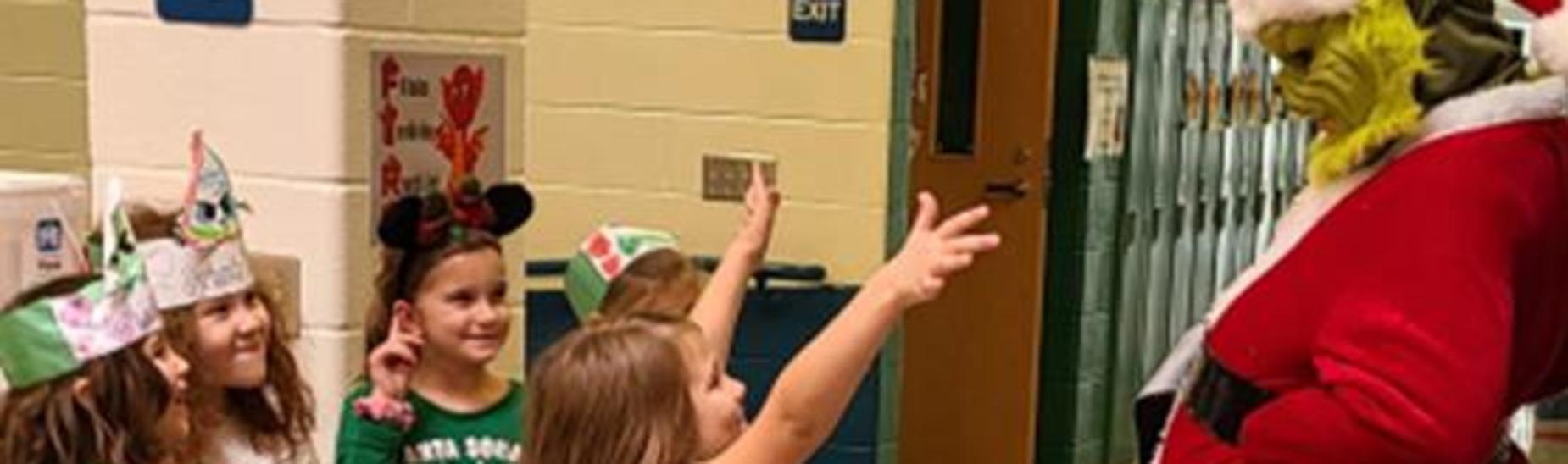 SCE Student with Grinch