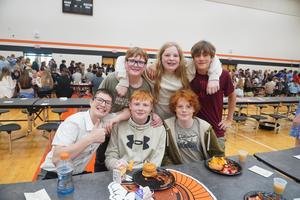 A group of students gather for a photo.