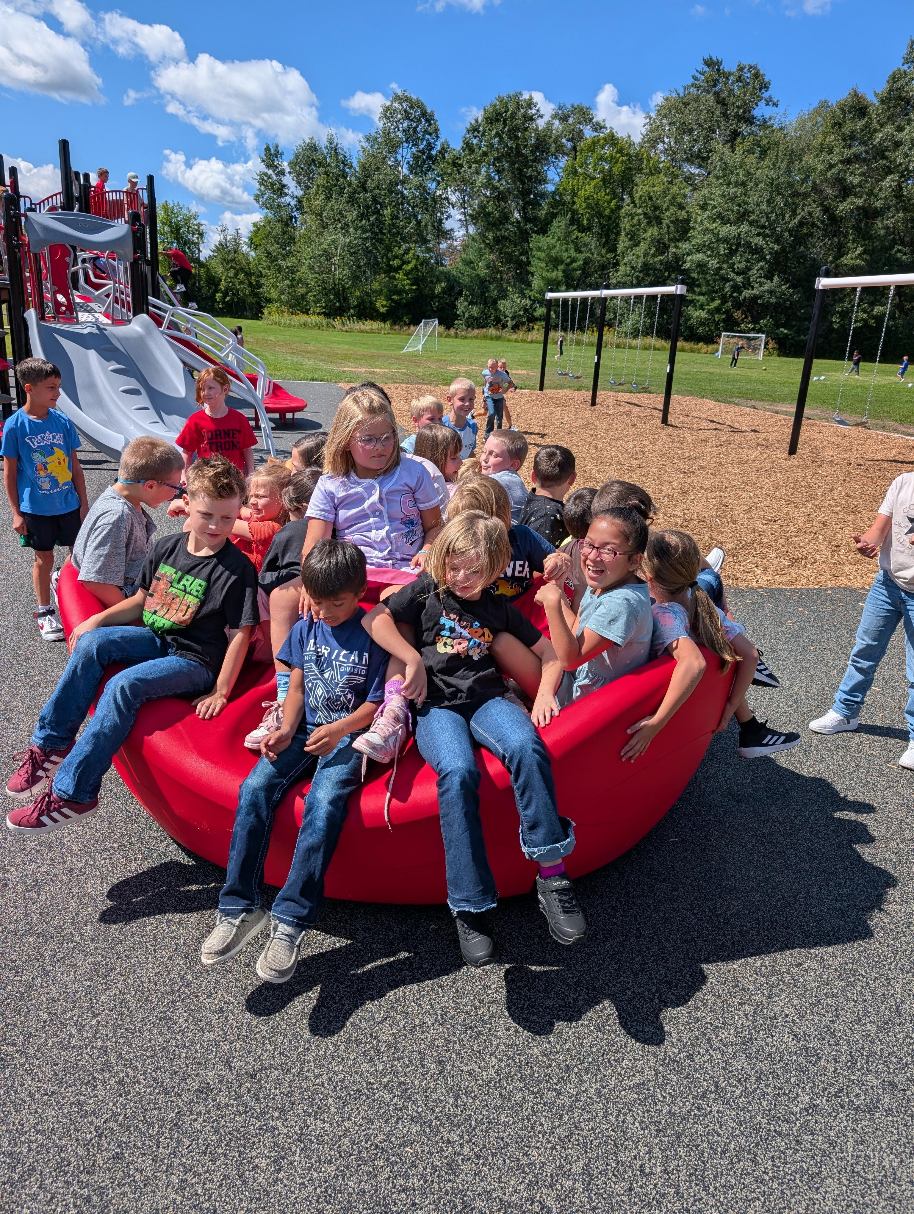 A group of students having fun on the playground.