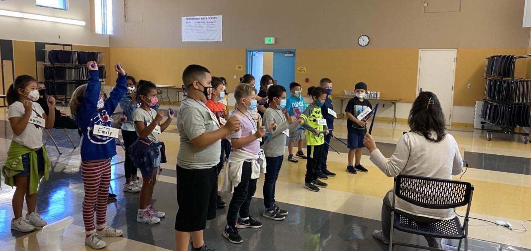 Room 11 playing instruments in music class