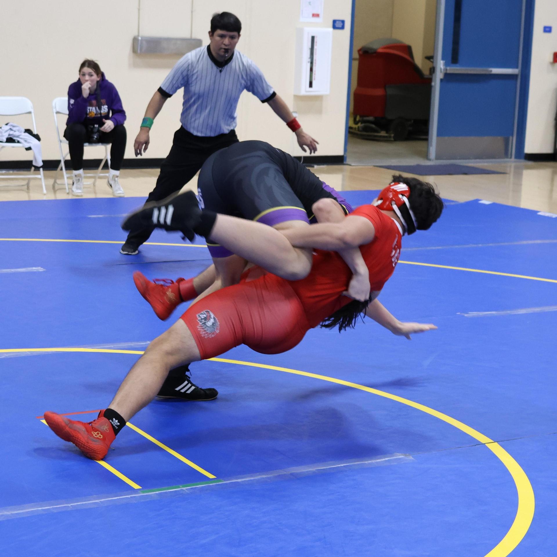 wrestlers in action at parlier