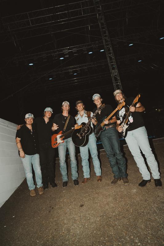 hudson westbrook band standing together