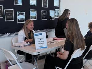 photo of counselor talking to student