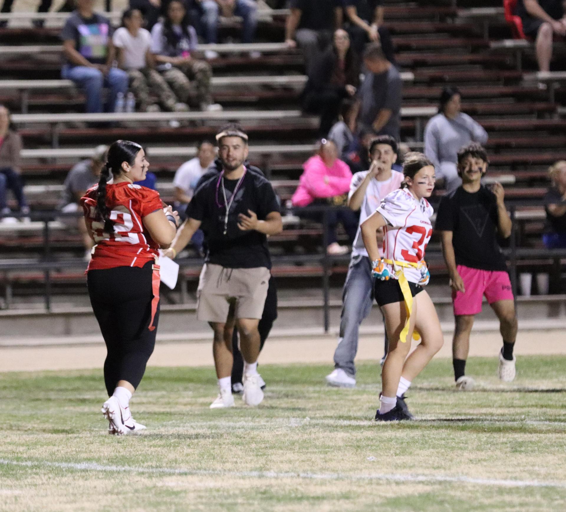 girls playing flag football