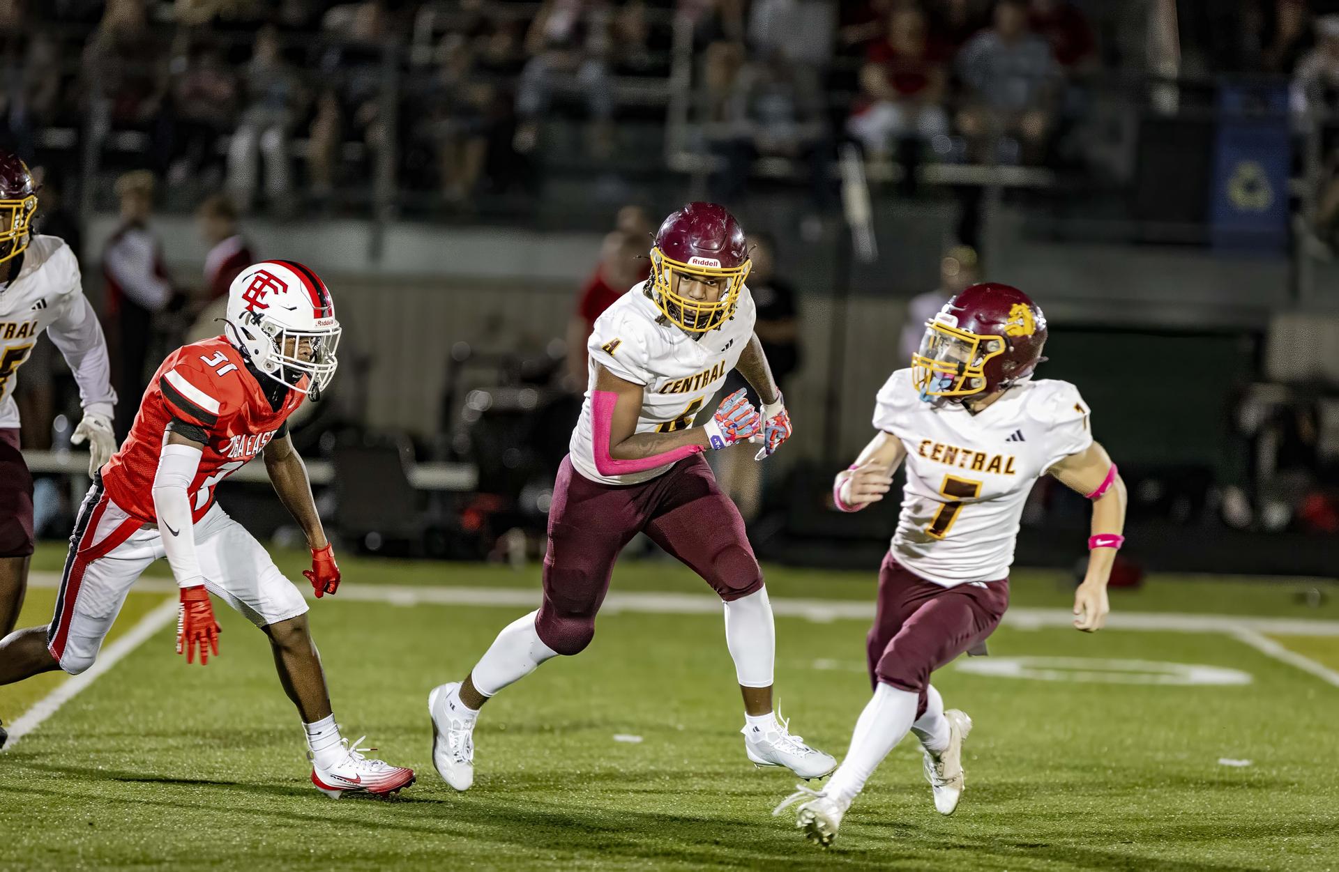Football player running with the ball