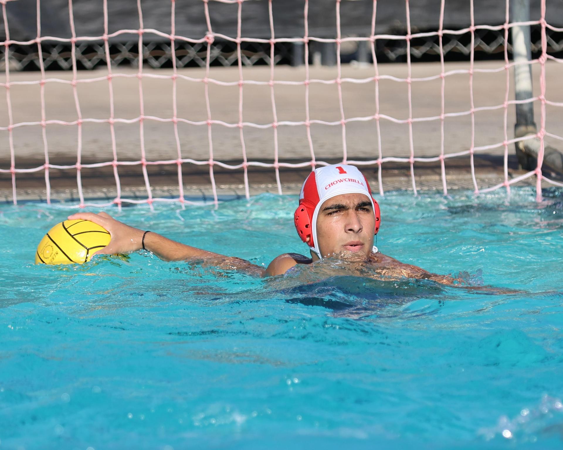 Boys playing water polo against Yosemite