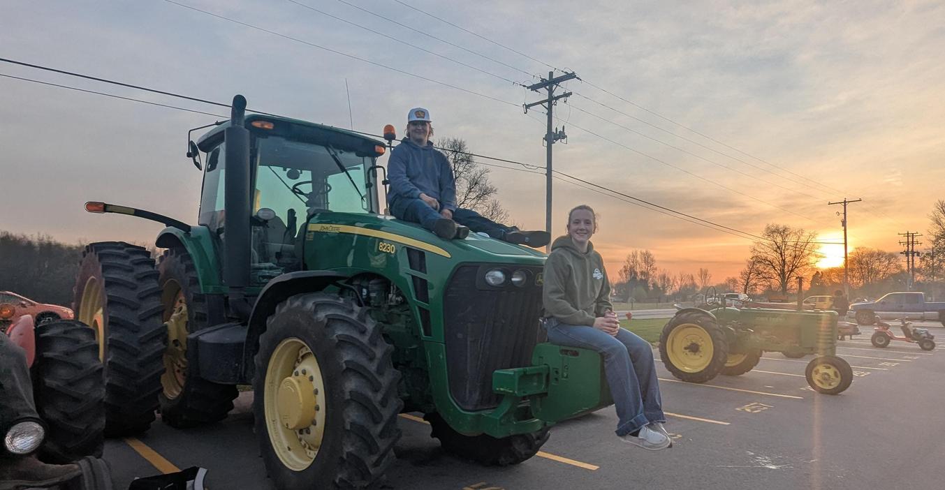 Students arrive early for the annual drive your tractor to school day.
