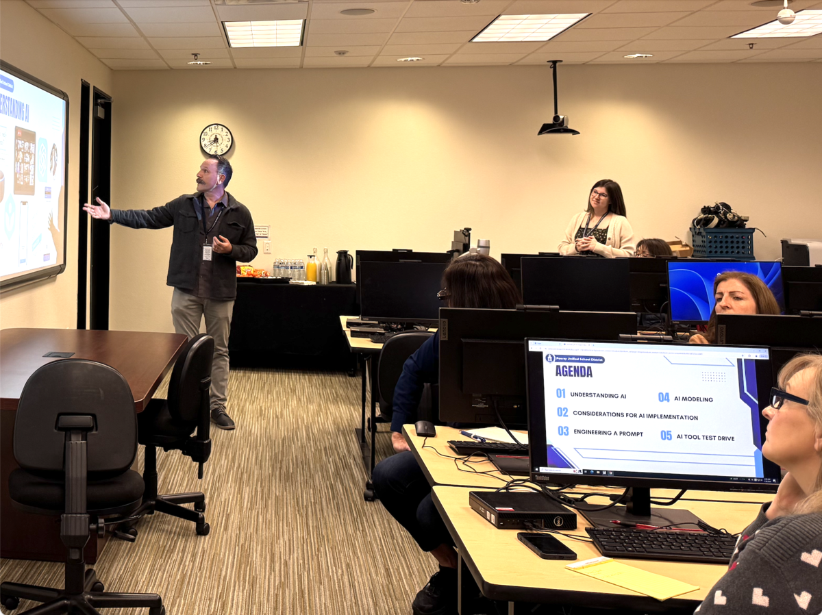 An educational technology coach is presenting on AI at a Tech Cafe.