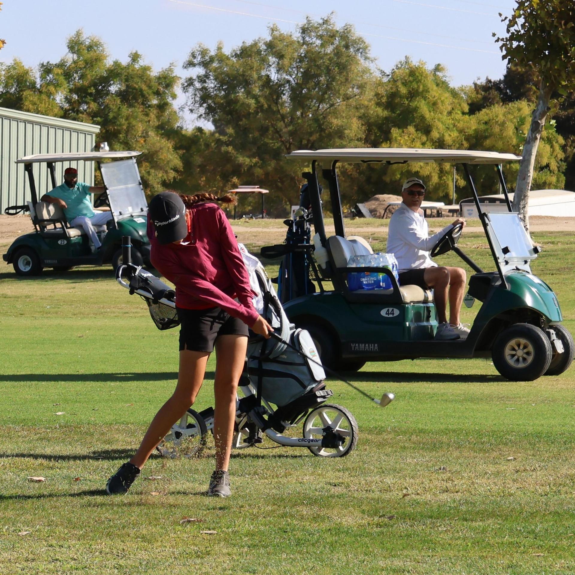 Girls golfers in action at the championships
