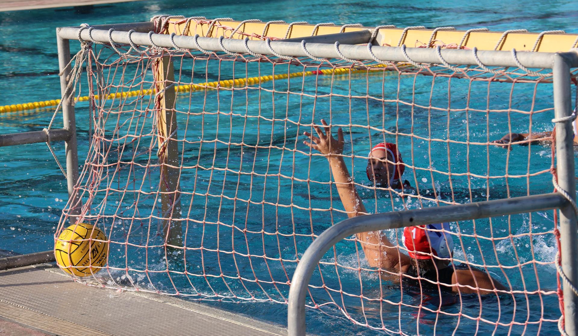 girls playing water polo against Sanger West