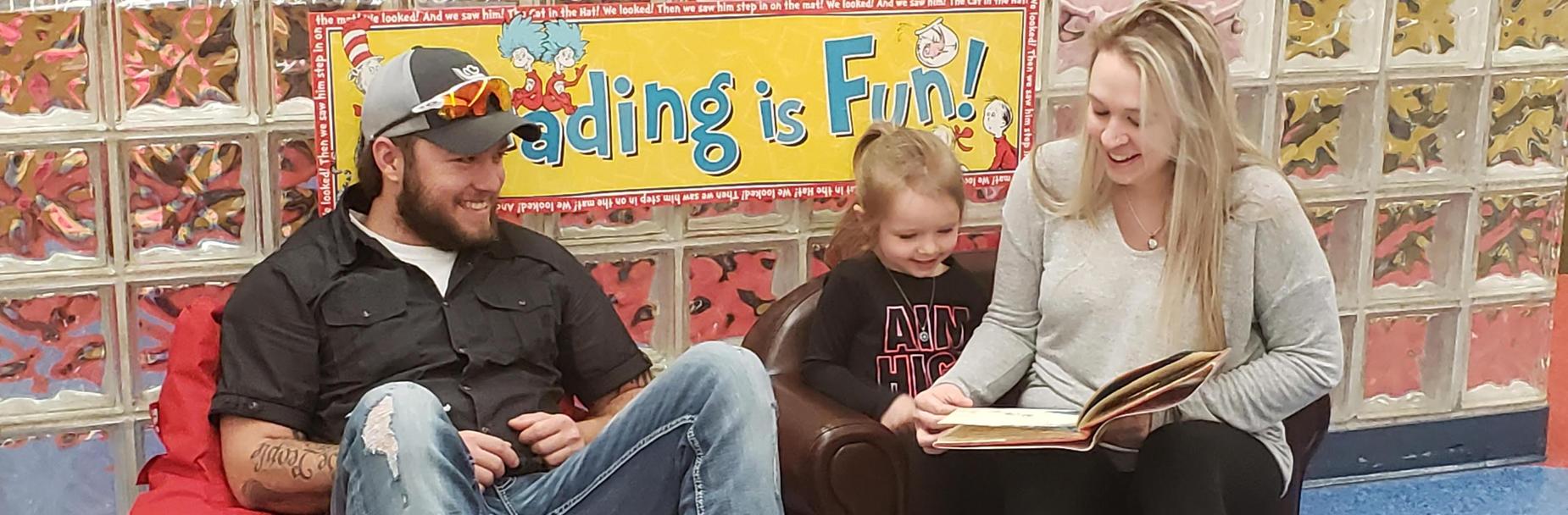 PreK students read with family