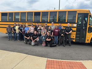 Bus Drivers in front of Bus