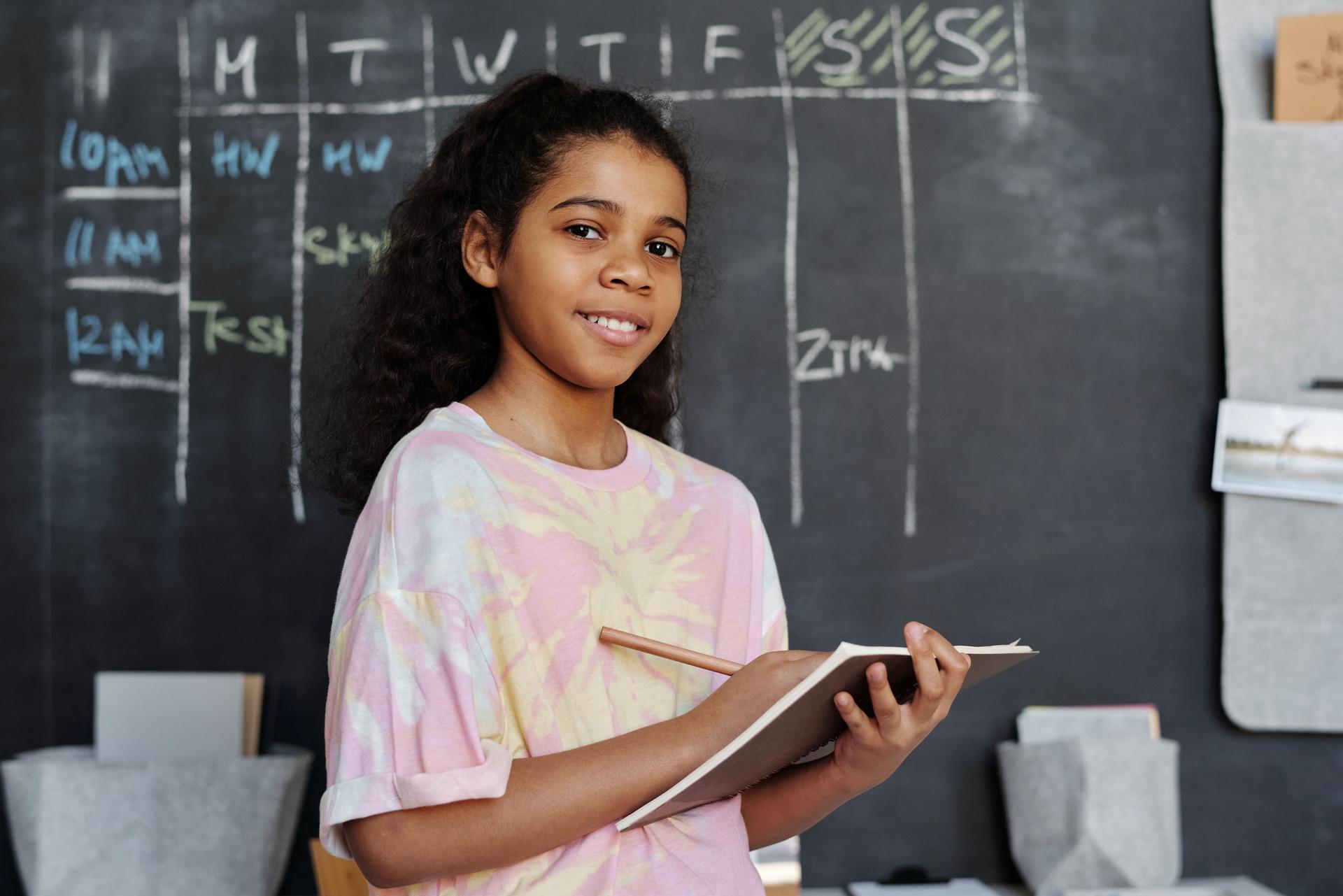 student at board
