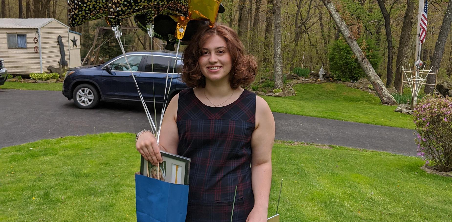 Senior receiving cap and gown