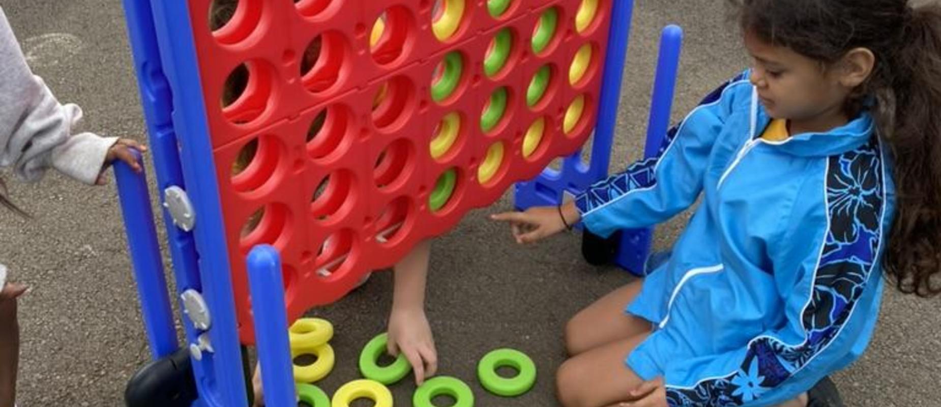 Students playing games on the blacktop
