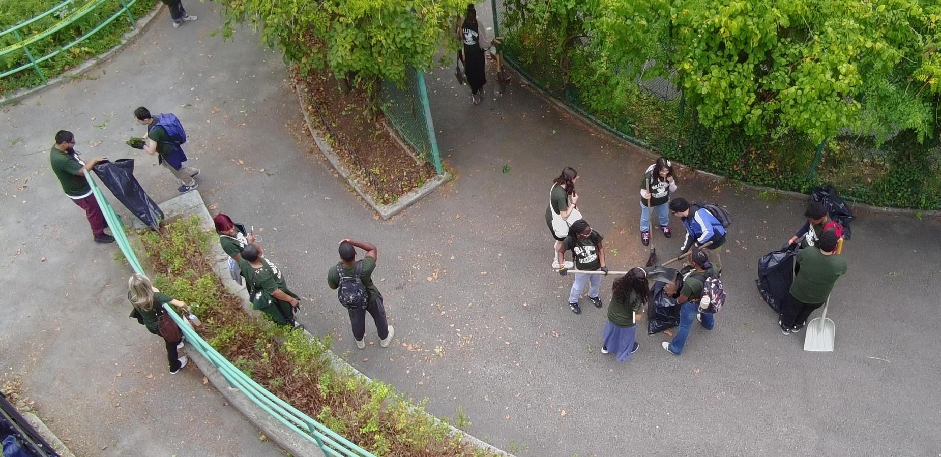 Students cleaning the park for community service.