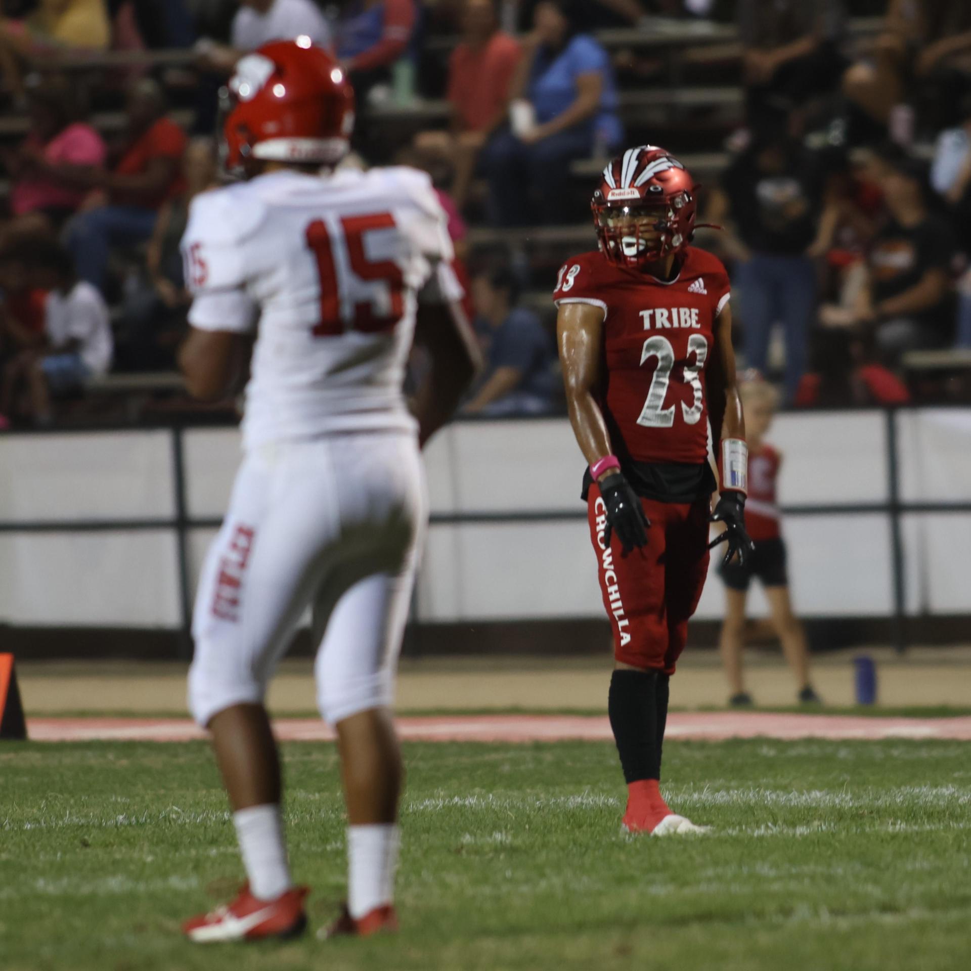 varsity boys playing football against Fowler