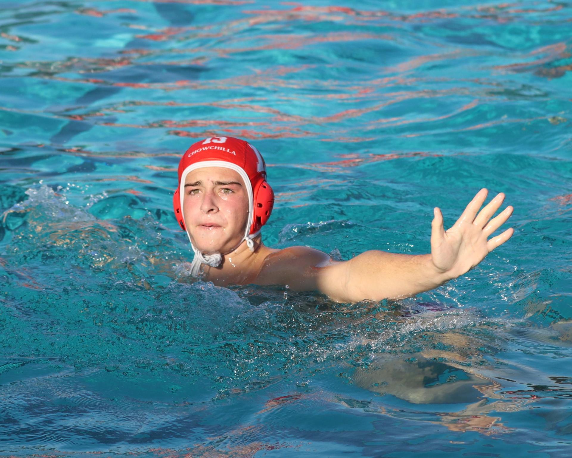 Boys playing water polo against Yosemite