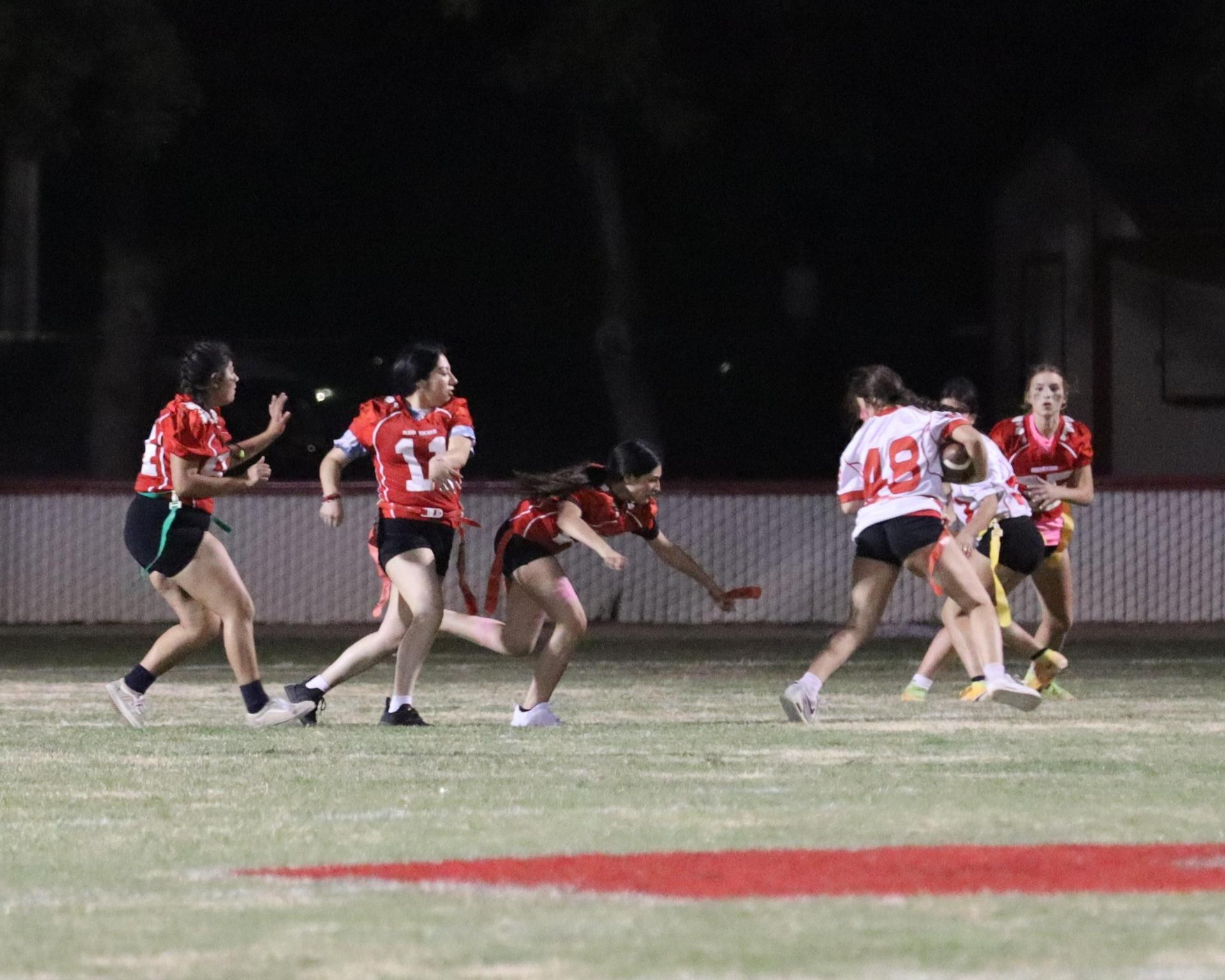 girls playing flag football