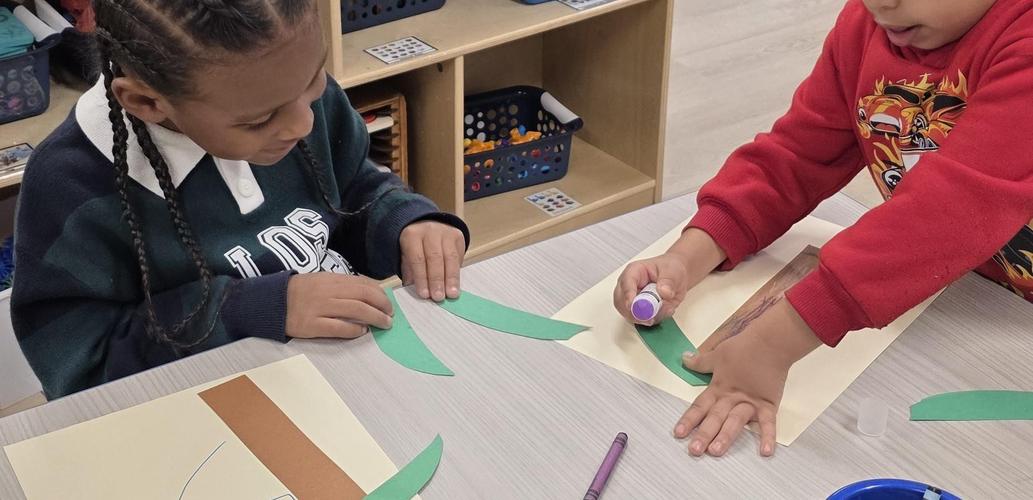 Using a variety of materials and collaborating with a friend to talk it through.