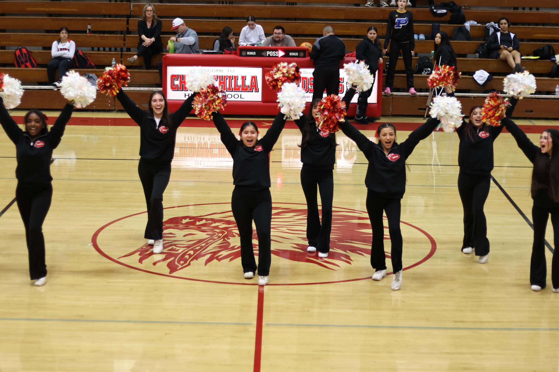varsity cheerleaders in action