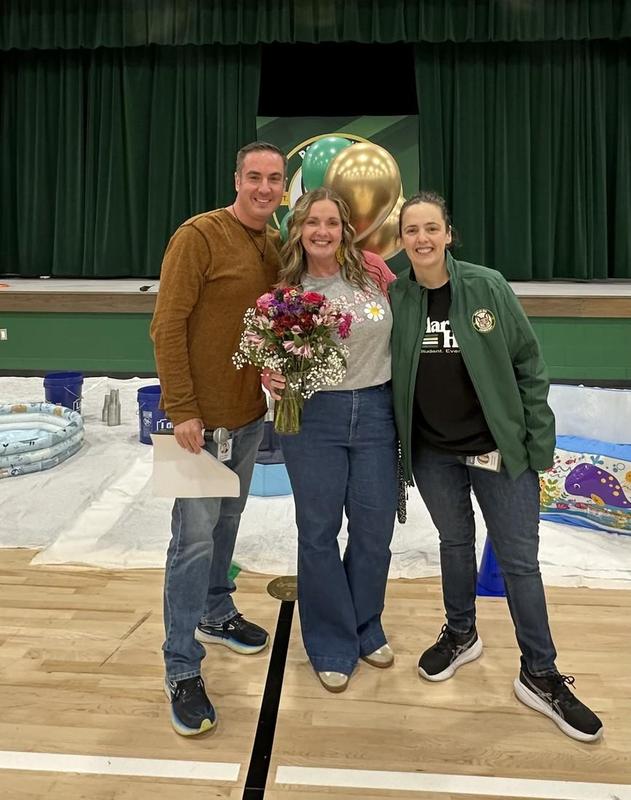 Photo of Teacher of the Year with admin.