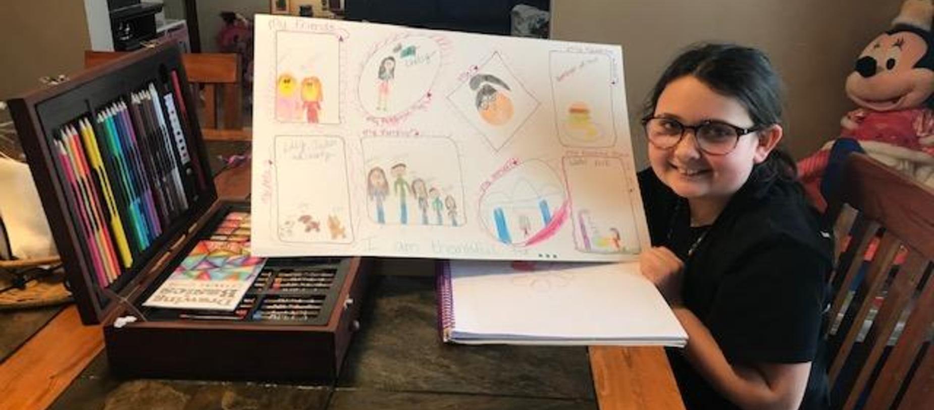 student drawing at home