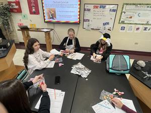 Demonstrating how rocks move through the rock cycle.