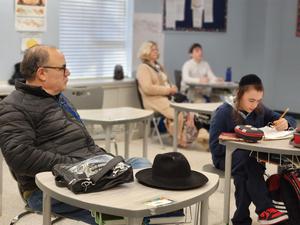 Grandparents sit in on classes.