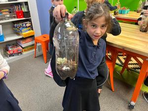 a second grader shows off her tarrairum