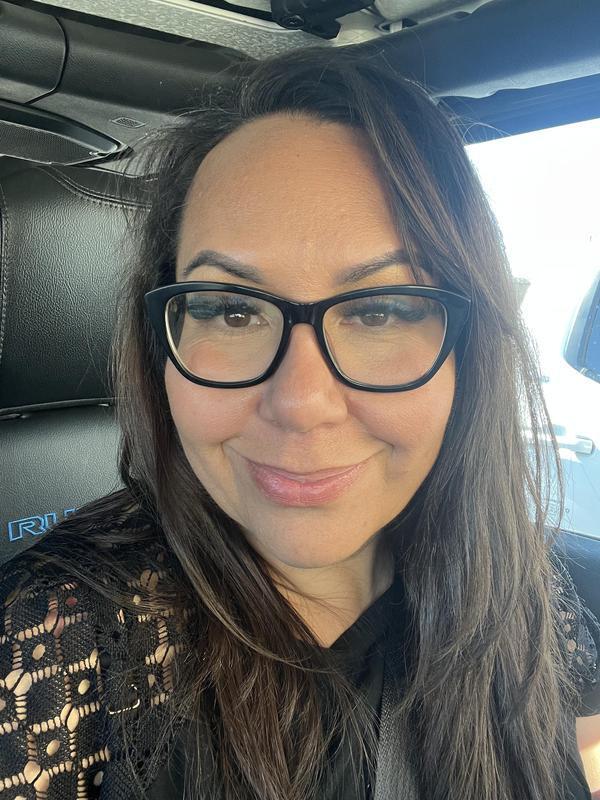 Women with long brown hair and glasses.