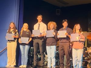 Students receiving certificates