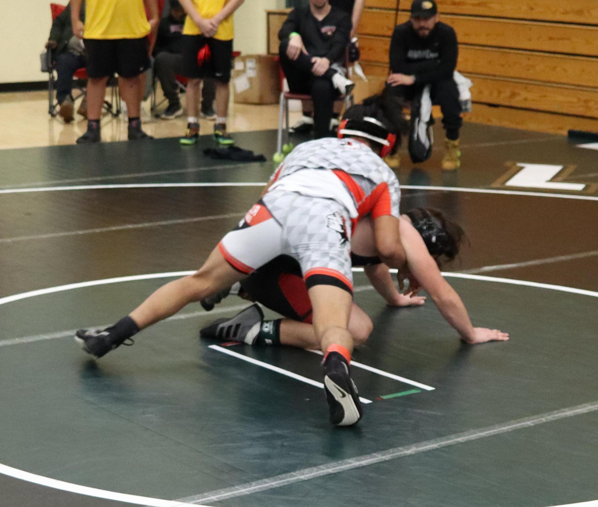 wrestlers in action at the Hawks invitational