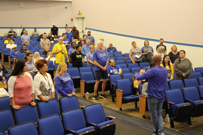 Superintendent Richard Ray leads a Back-to-School Bash activity with TSB faculty and staff.