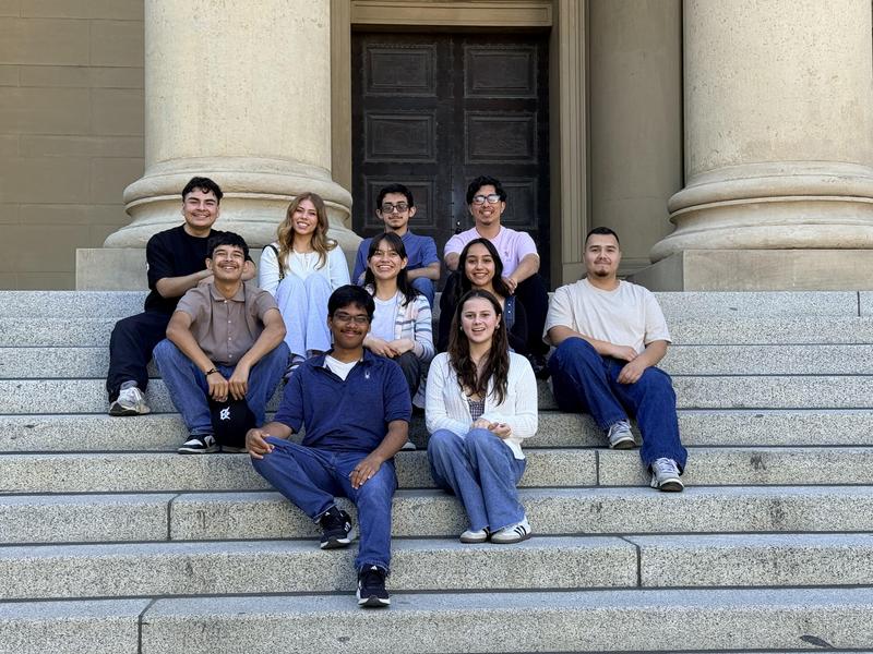 Harmony Magnet Academy's Academic Decathlon team poses on the steps of a building at the State Championships in Santa Clara.