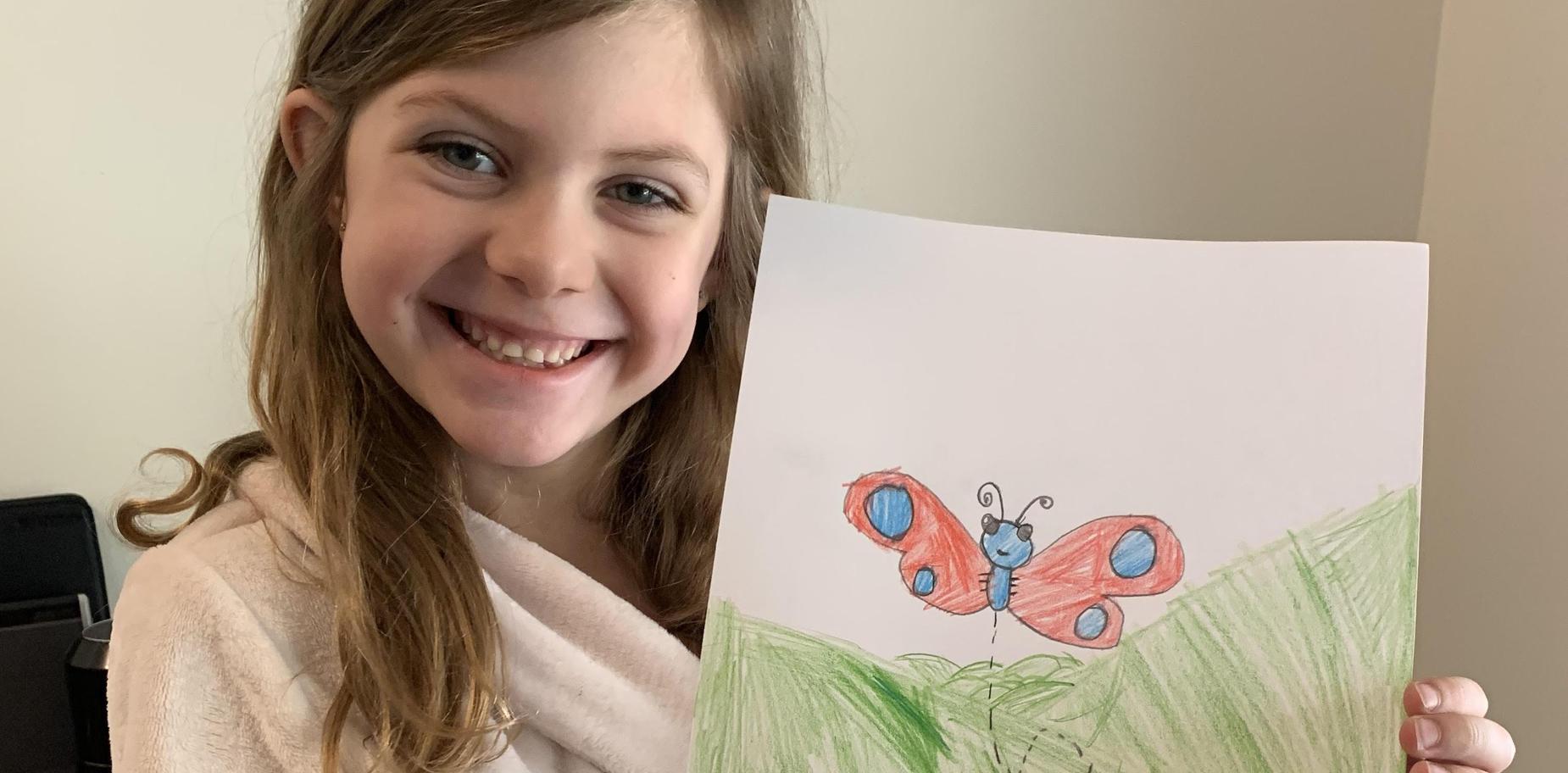 Student with her artwork
