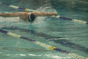 FCTS swimmer does the butterfly at a competition