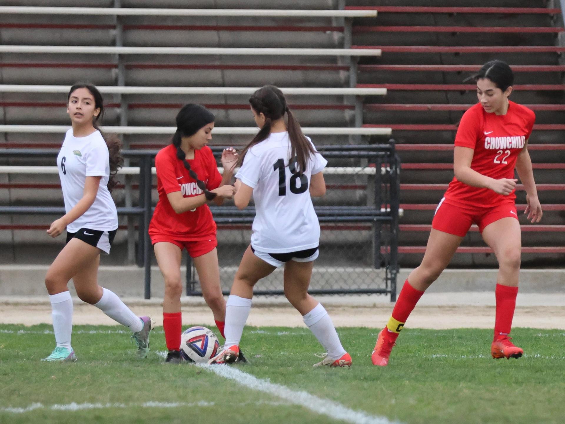 Junior Varisty girls playing soccer against liberty