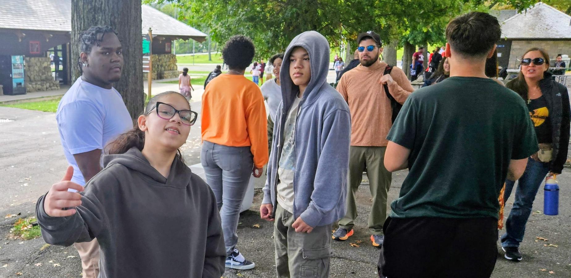 Students pose for community building trip.