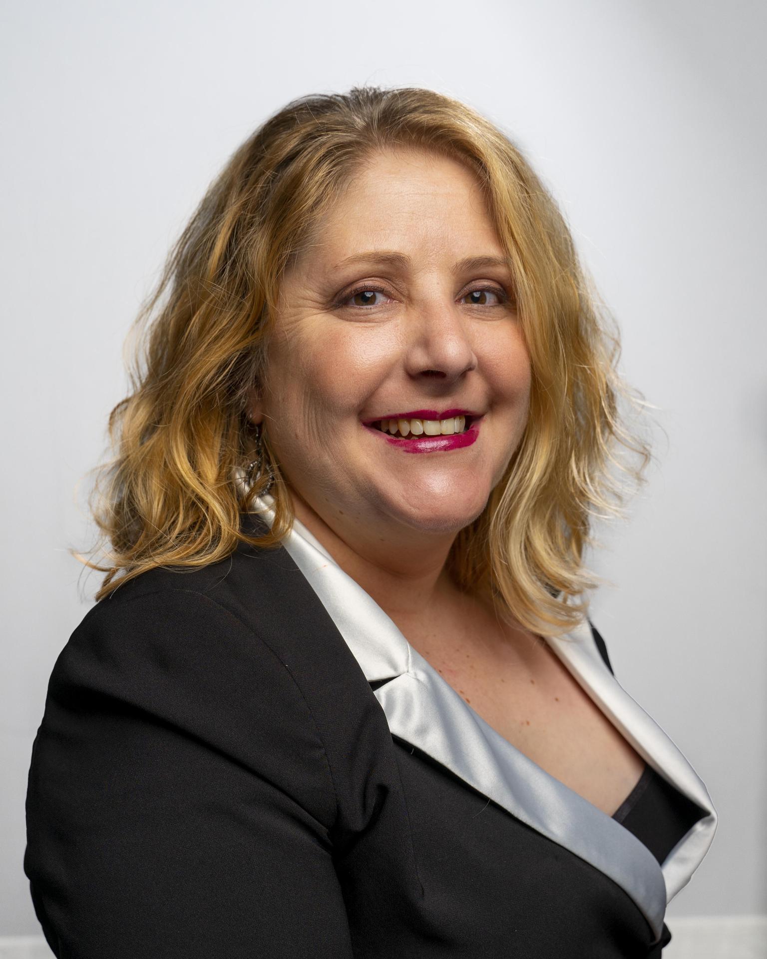 Krystle Wells, Choir Director