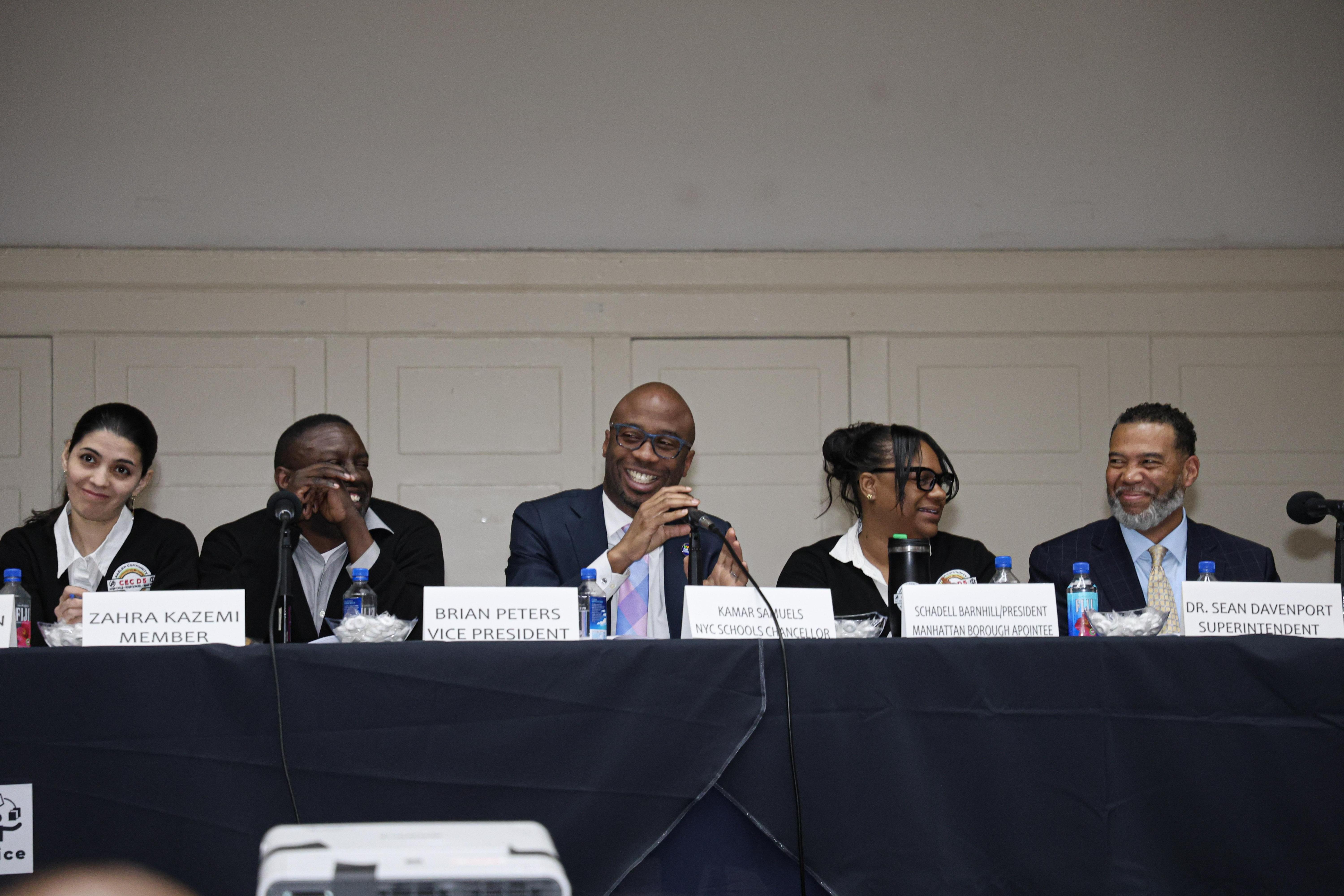 Panel discussion with seven members, including Chancellor Kamar H. Samuels.