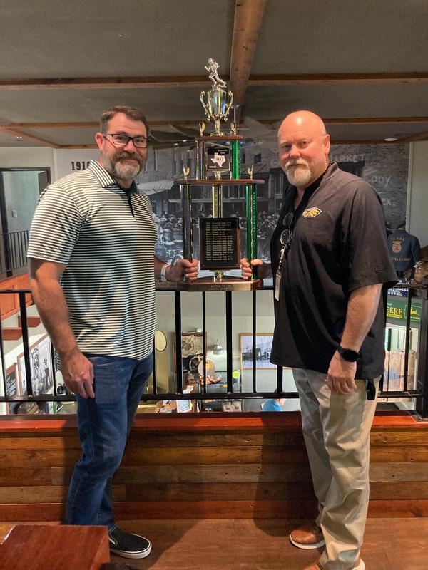 Superintendents Miller and Kilgore with the Battle of 107 trophy.